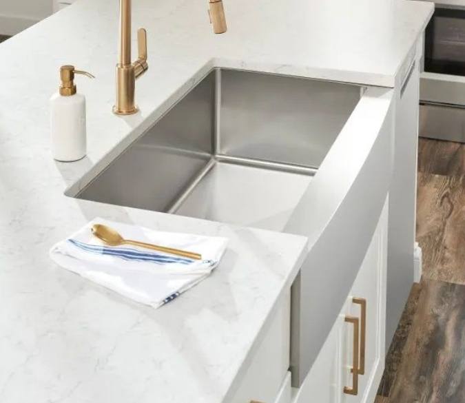 Stainless steel kitchen sink, gold faucet - we sell everything including these